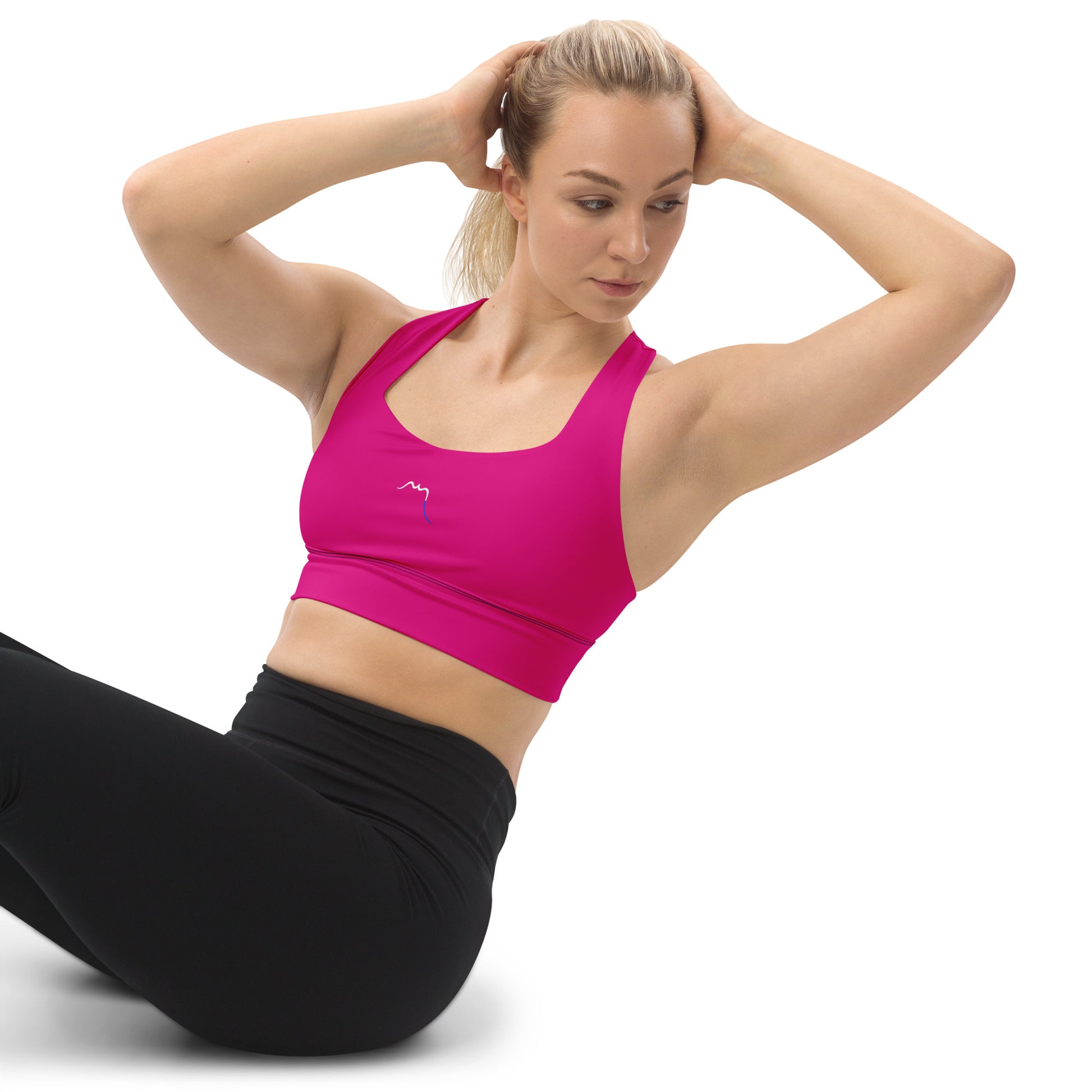 Vue de face de la brassière de sport recyclée Carlina - coloris fuchsia